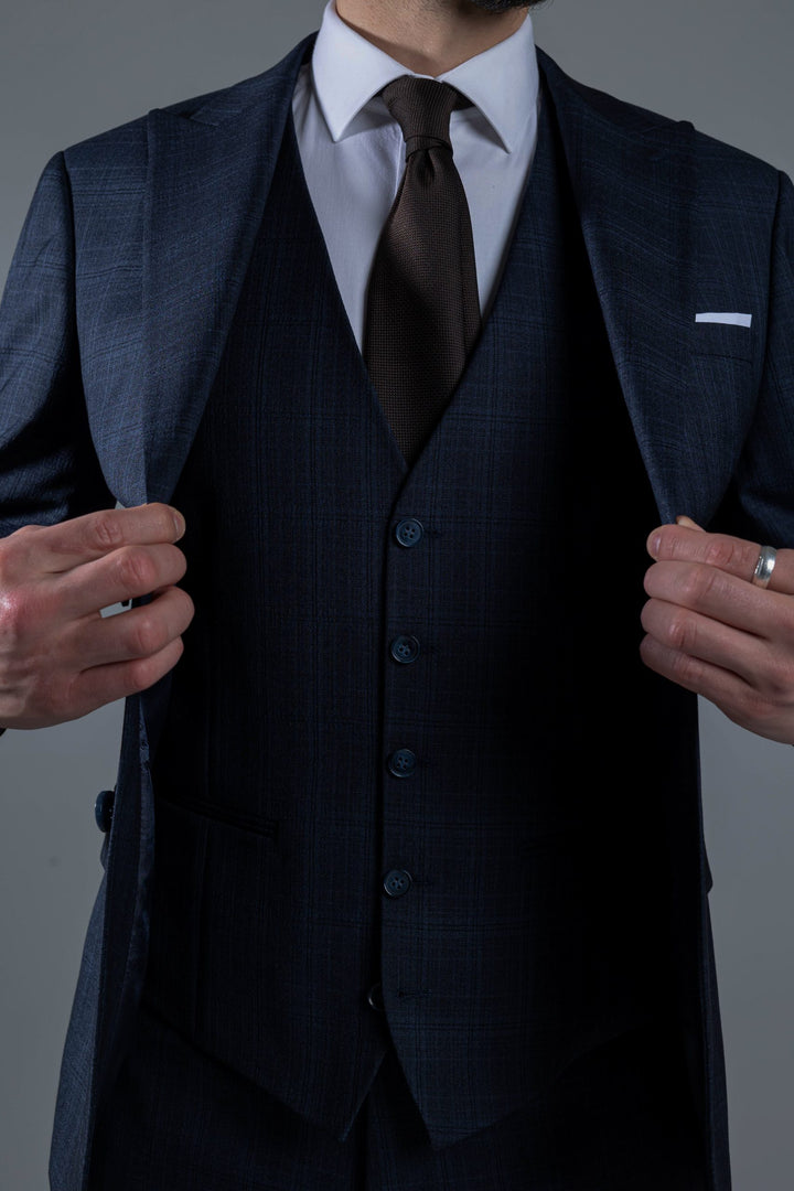 Three-piece navy blue checked suit