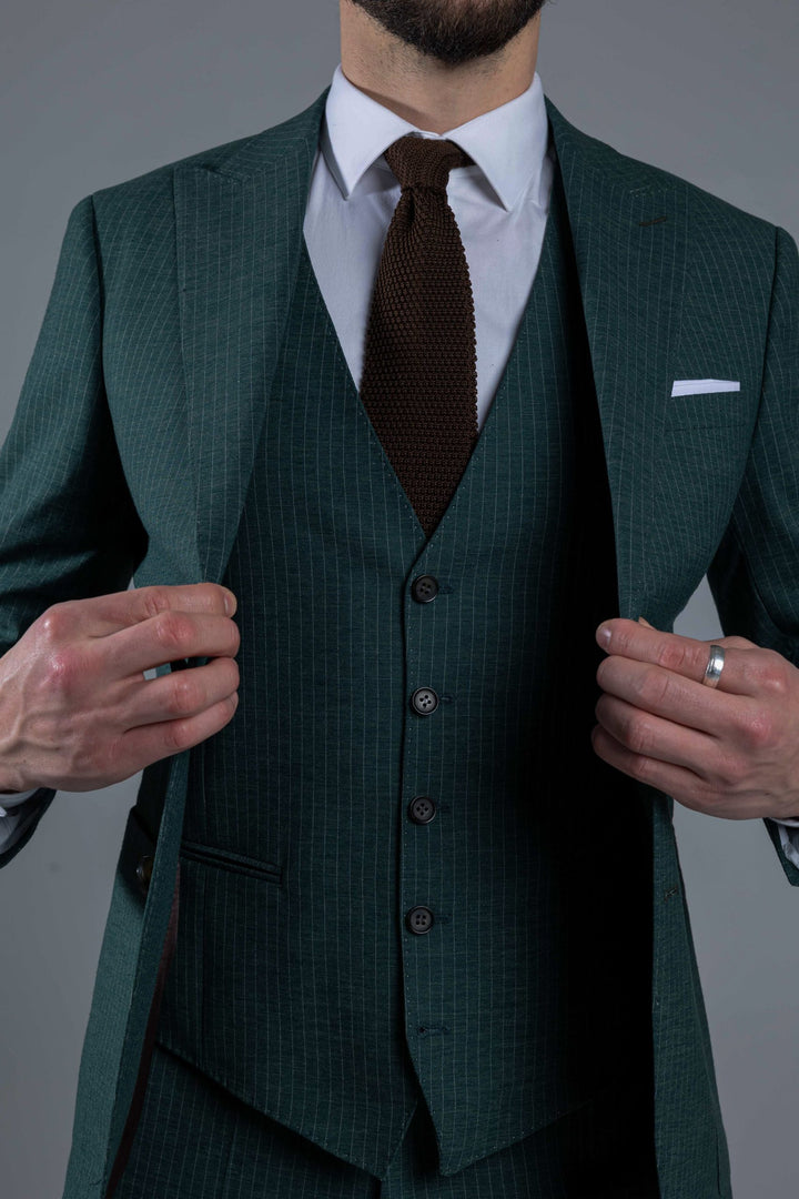Three-piece green suit with stripes