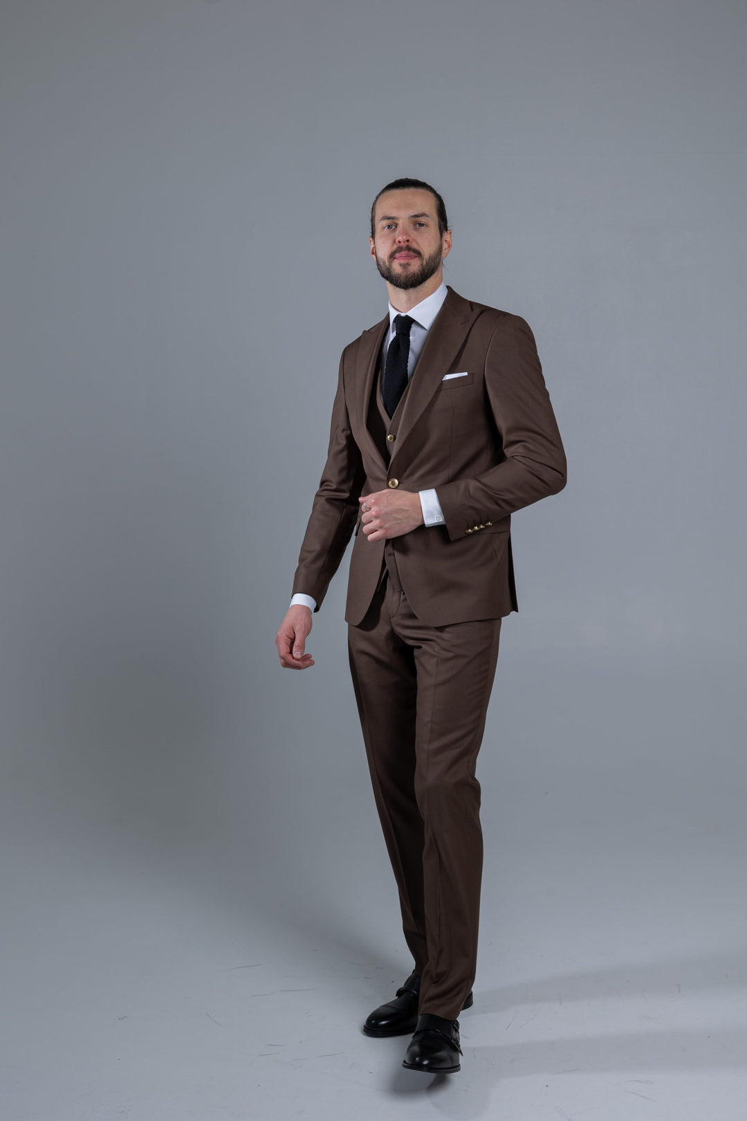 Three-piece brown suit