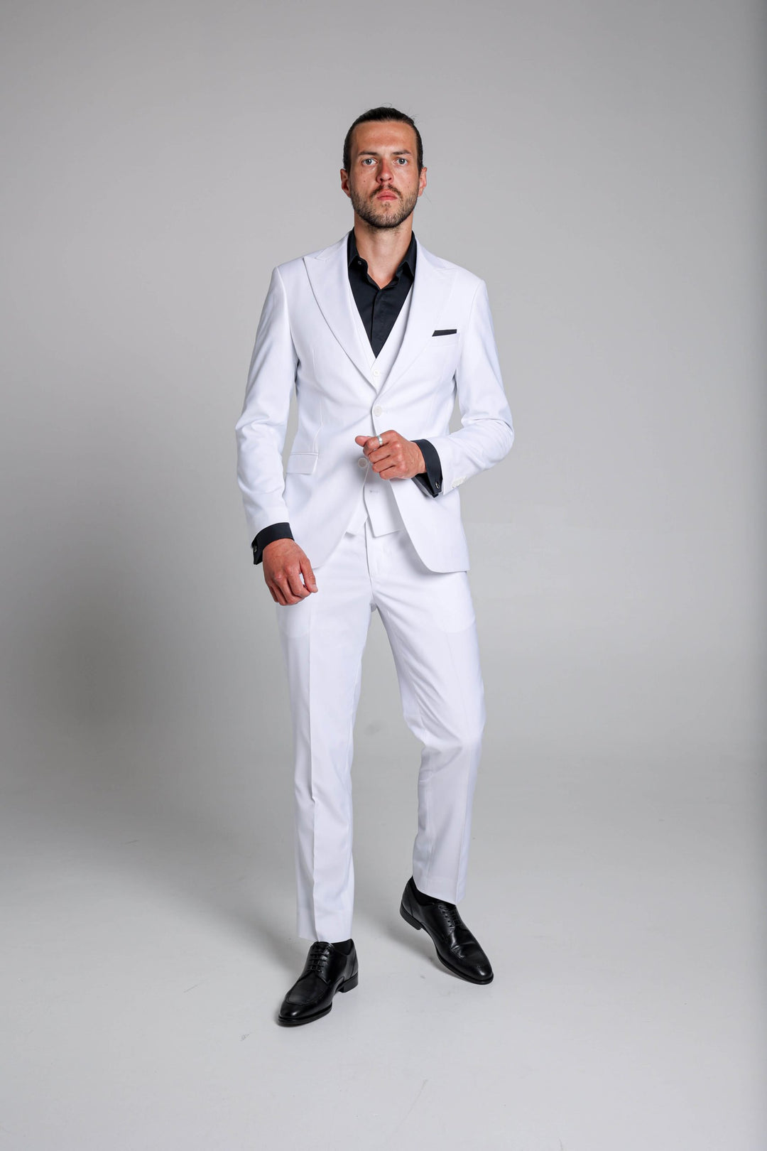 Three-piece white suit