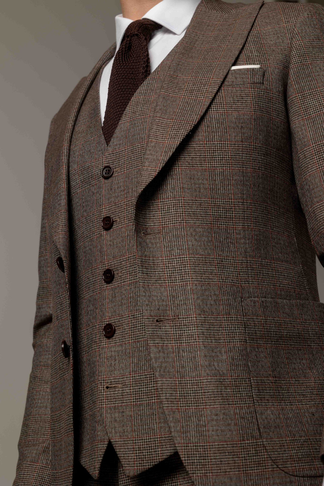 Three-piece suit in brown with fuzzy checks