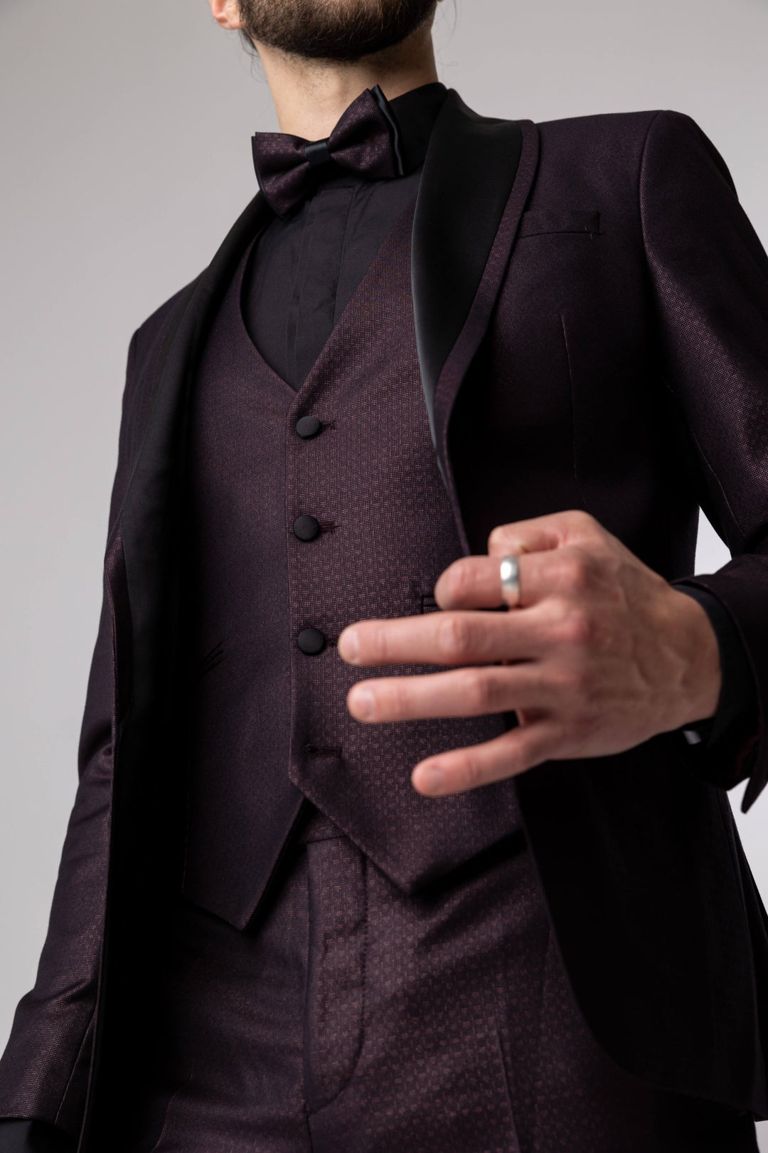 Three-piece burgundy tuxedo with bow tie