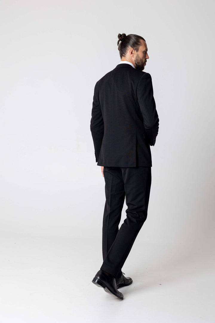 Three-piece black suit