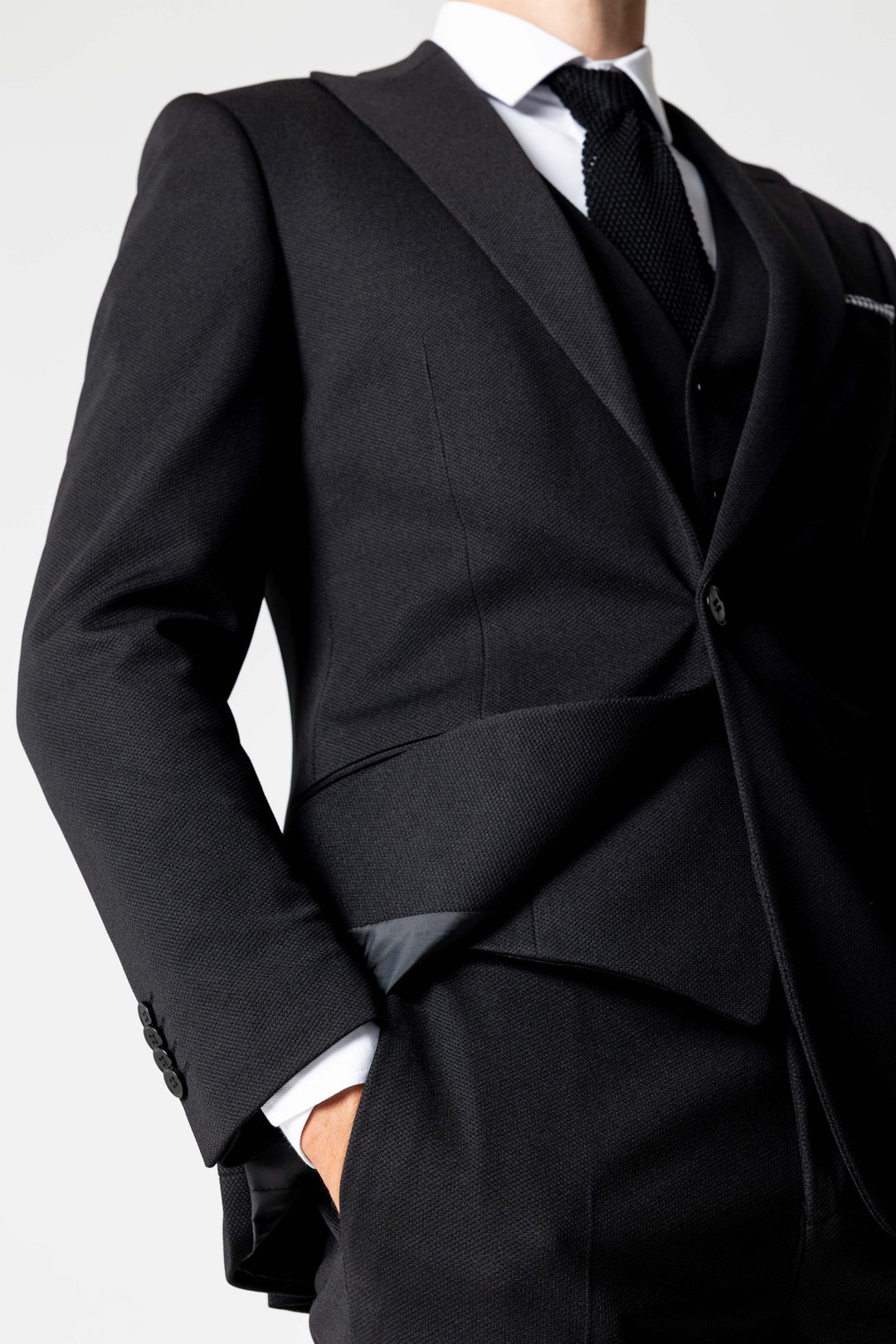 Three-piece black suit