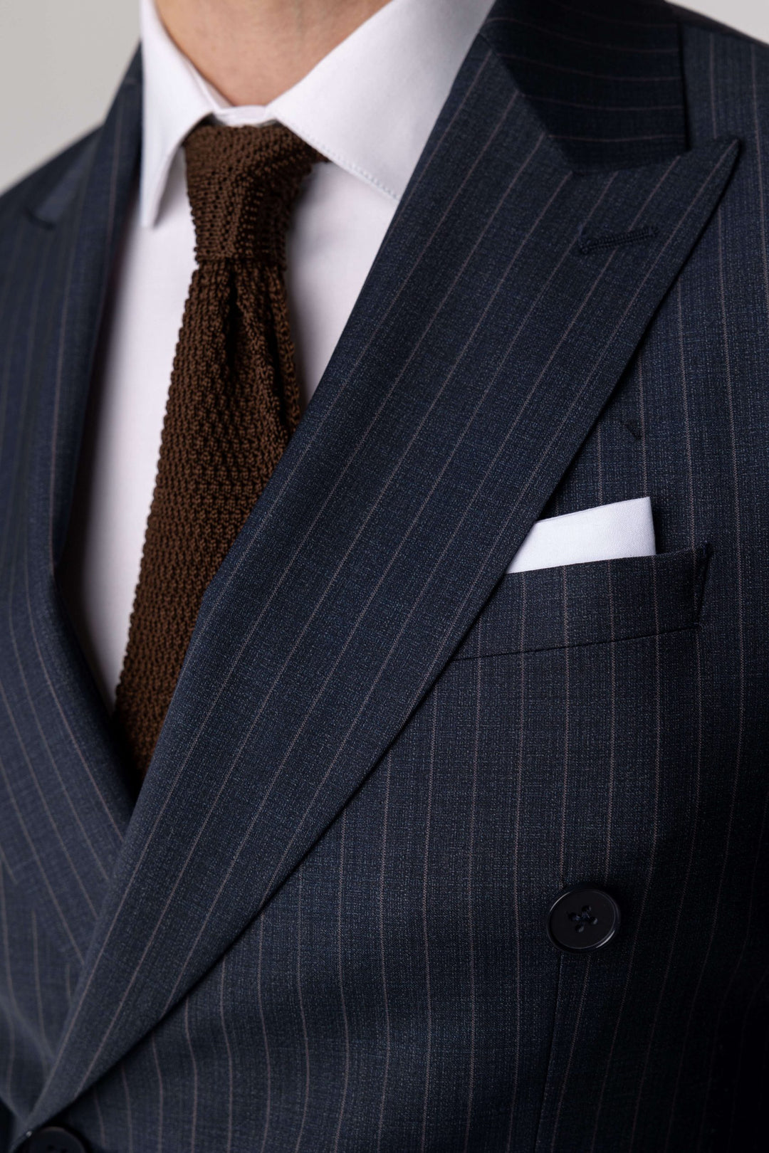 Two-piece gray-blue suit with brown stripes and double-breasted jacket