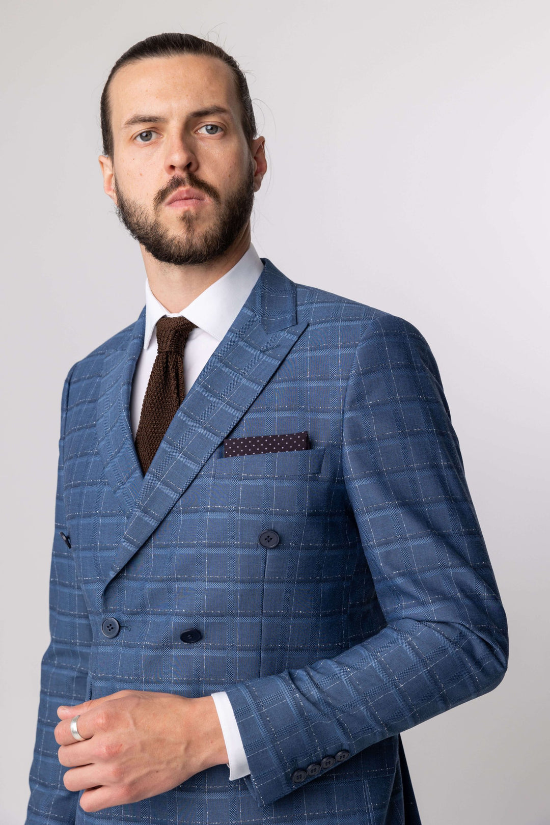 Two-piece light blue checked suit with double-breasted jacket