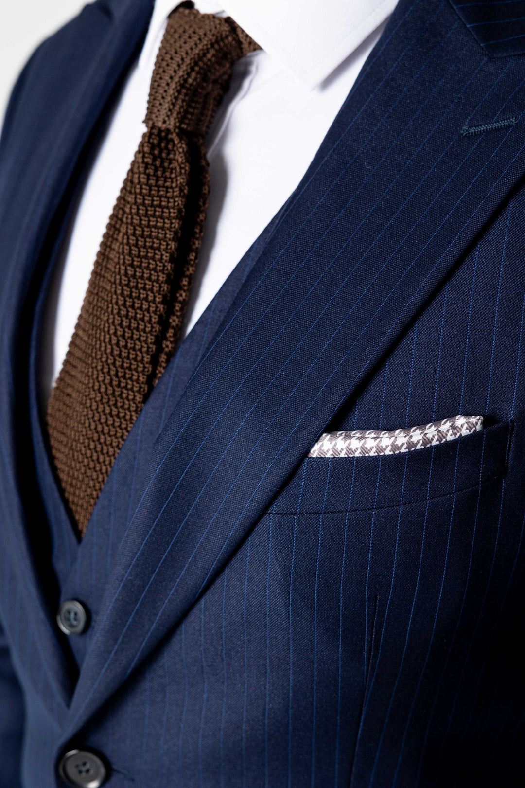 Three-piece blue suit with stripes