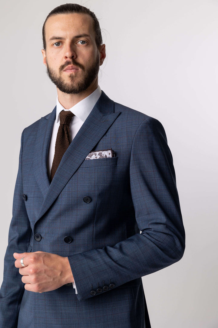 Two-piece blue suit with fine print and double-breasted jacket