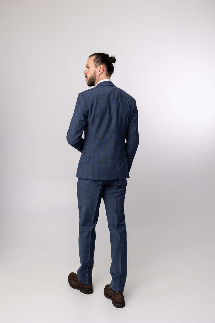 Two-piece blue suit with fine print and double-breasted jacket
