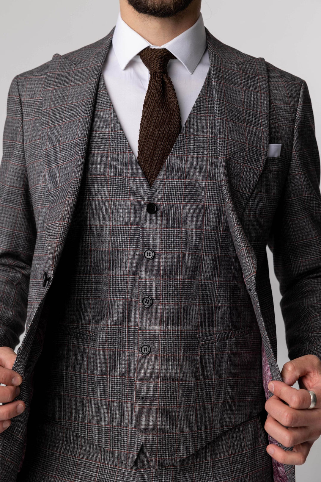 Three-piece gray suit with fine print