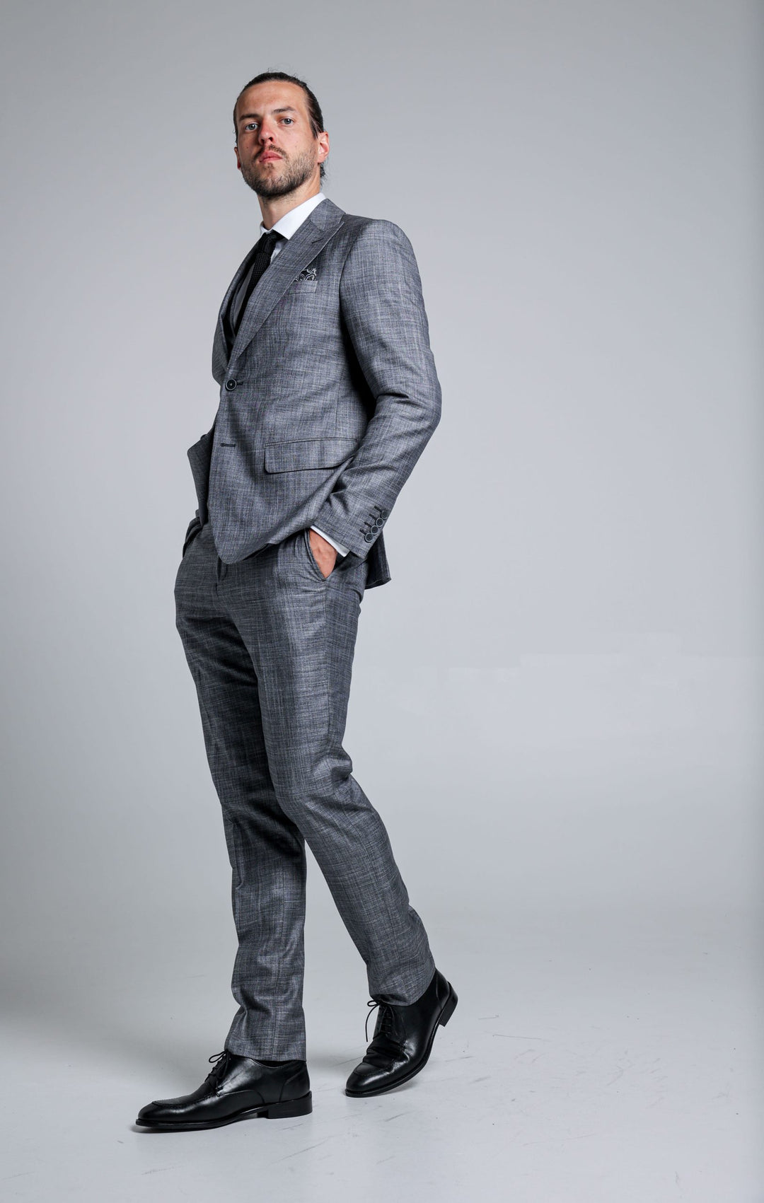 Three-piece gray suit