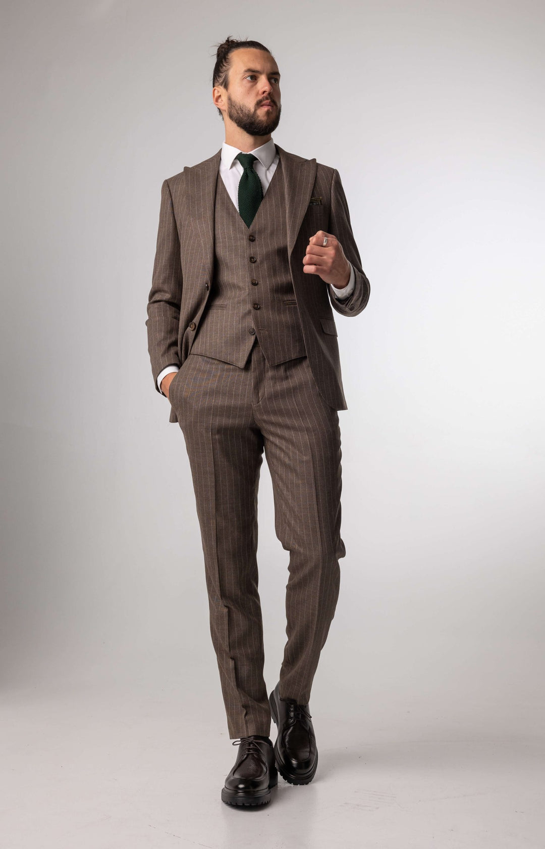 Gray brown three piece suit with stripes