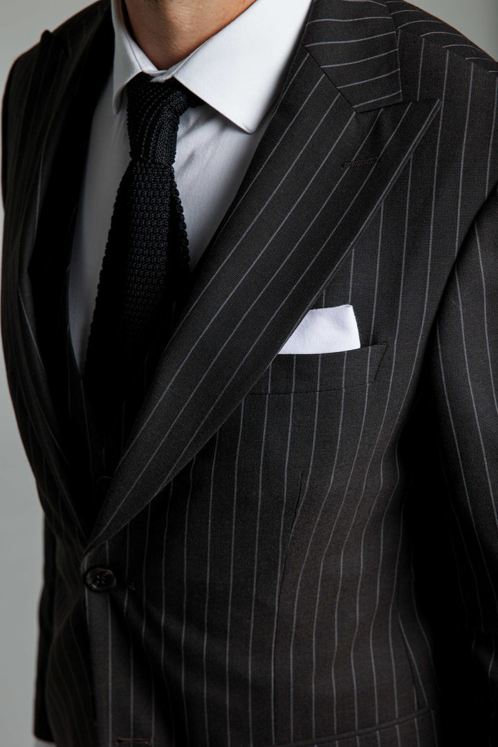 Three piece suit with lines