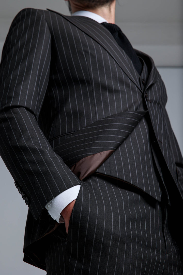 Three piece suit with lines