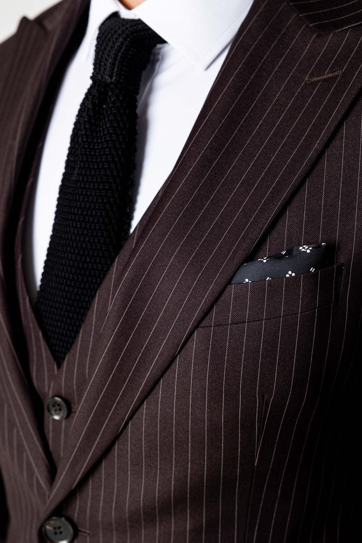 Three-piece suit in dark brown with stripes