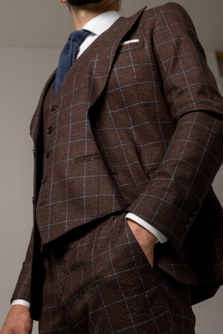 Three-piece brown check suit
