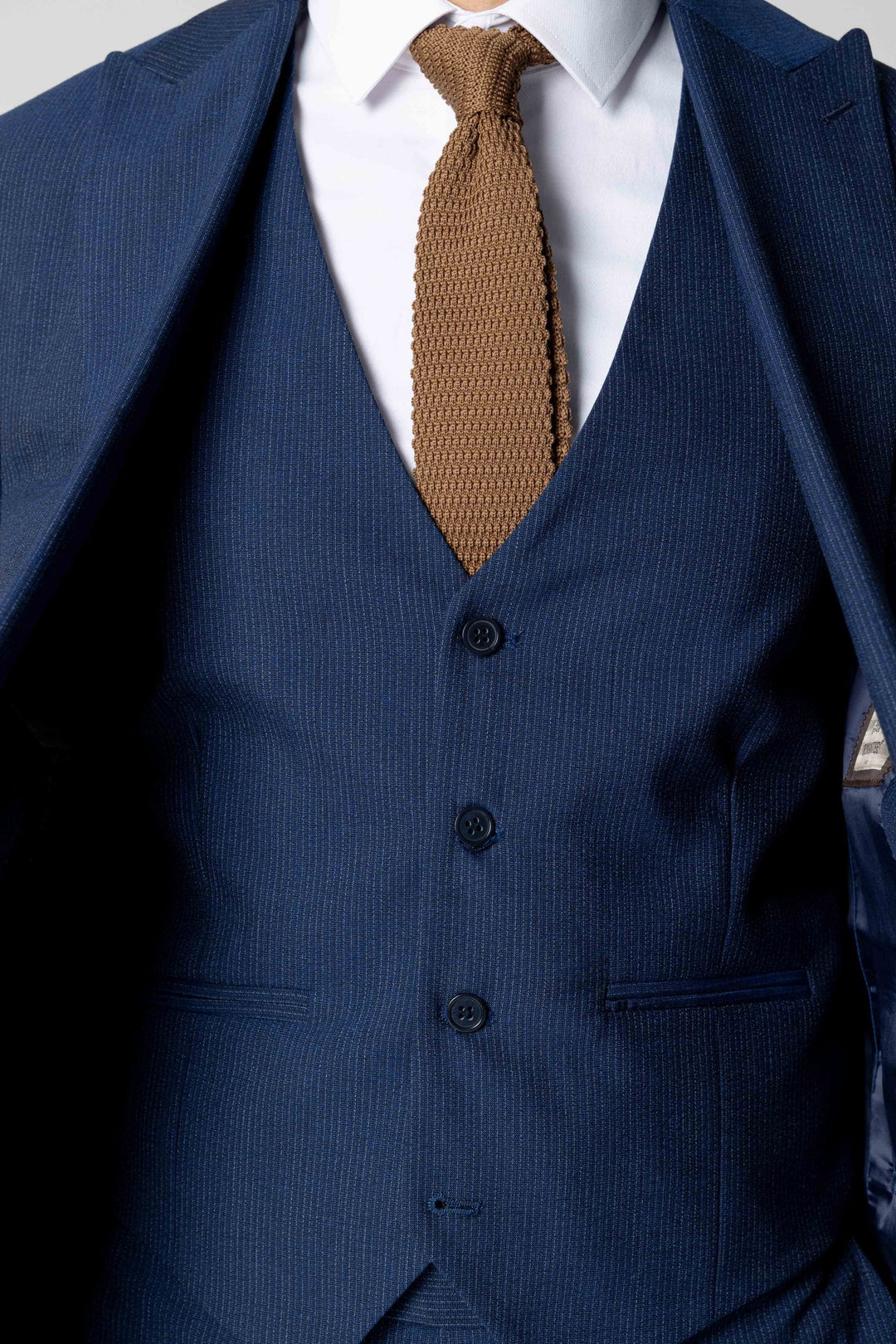 Three-piece blue suit with fine lines