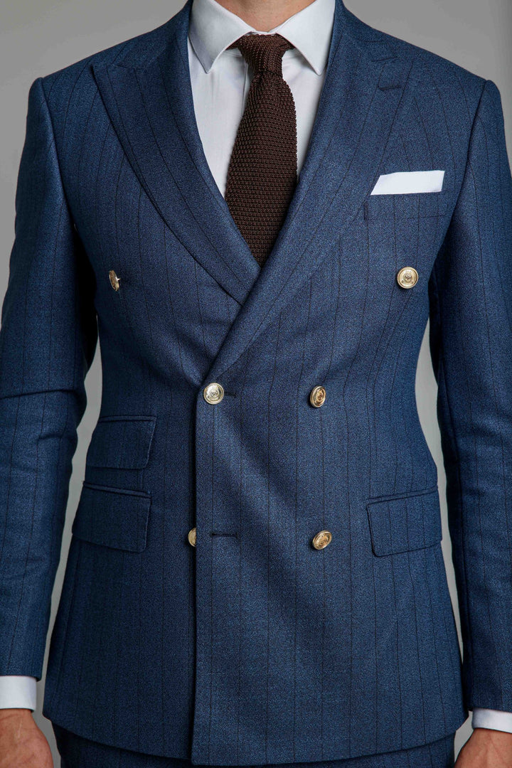 Two-piece blue suit with lines and a puffy jacket