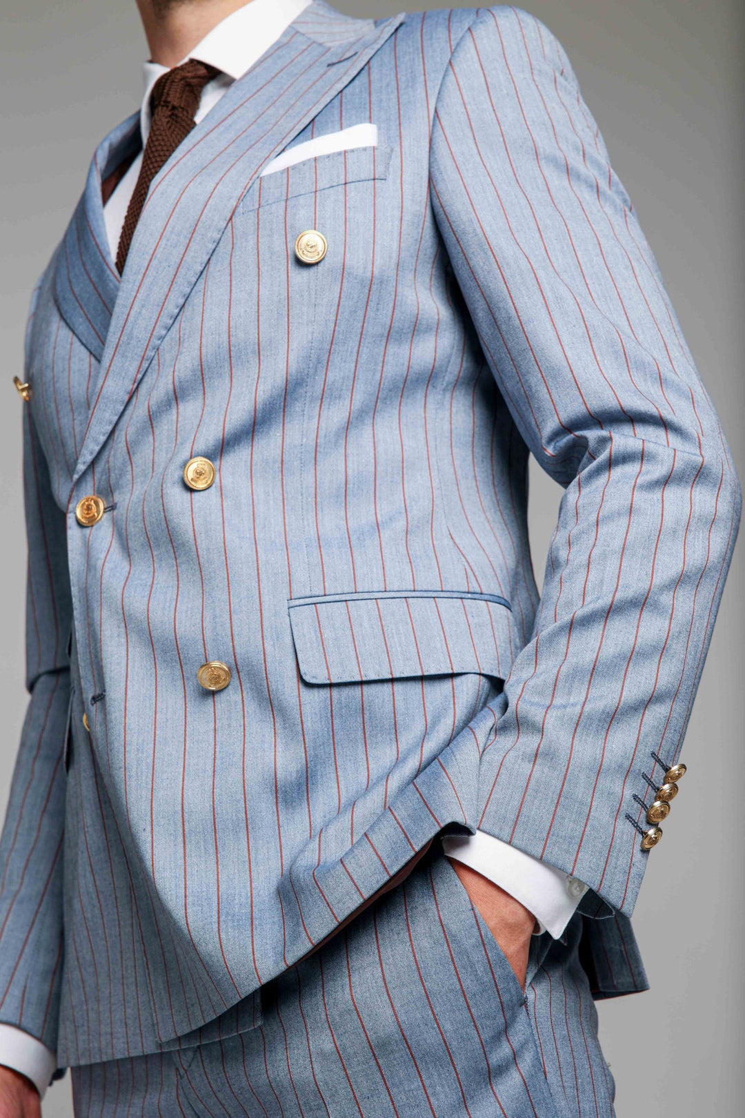 Two-piece light blue suit with stripes and double-breasted jacket